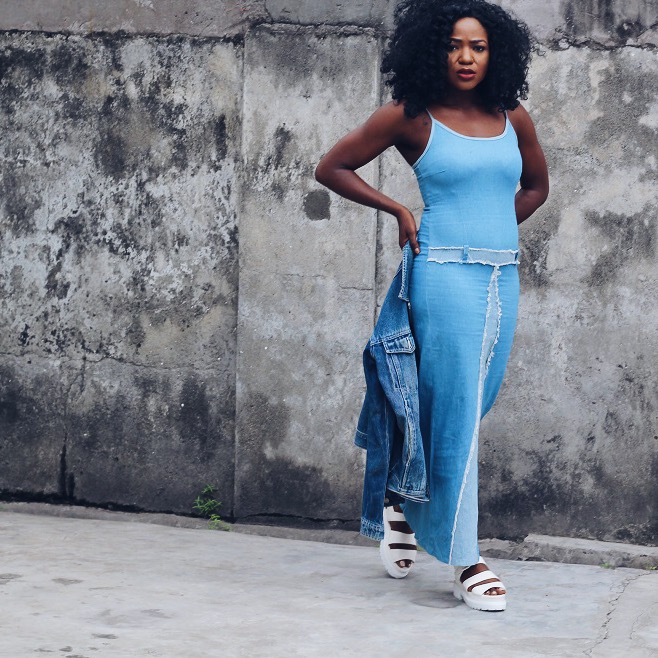 Girl strutting wearing denim dress and denim jacket