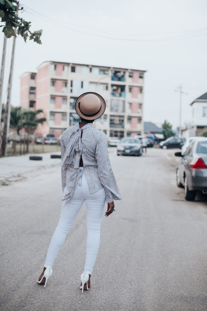 styling paisley print tie back top with white jeans